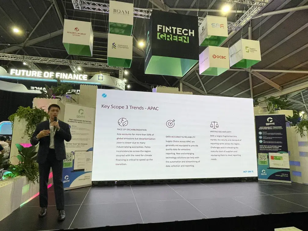 Brandon Tan of ACT Group presenting on Scope 3 trends in APAC at Singapore FinTech Festival 2025
