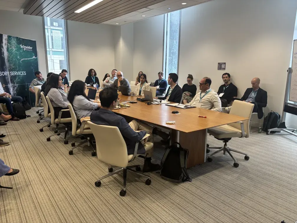 Attendees seated around a conference table during Scope 3 Peer Group Strategy Day Chicago 2026